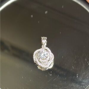 Elegant Silver Pendant with Sparkling Gemstone